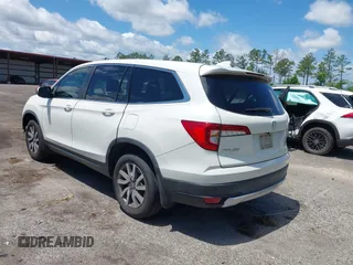 2019 Honda Pilot EX-L with VIN 5FNYF5H42KB026108, listed as a IAAI auction lot 42387593 with 112,556 mi miles and . Bid and sale history available at DreamBid. Image 3.