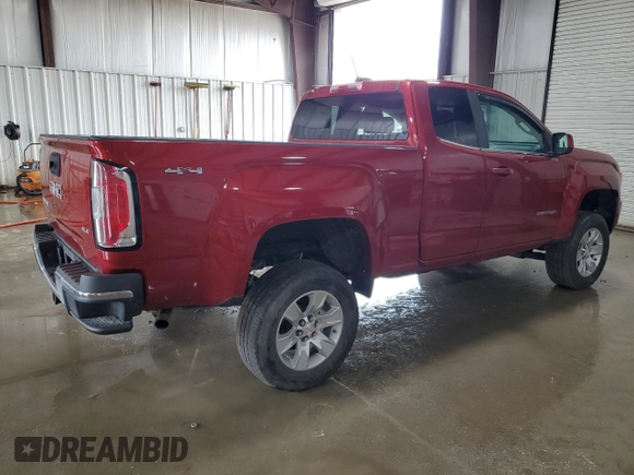 2015 GMC Canyon 4WD SLE with VIN 1GTH6BE39F1203164, listed as a Copart auction lot 51328885 with 107,171 mi miles and Salvage Title. Bid and sale history available at carsss.com. Image 3.