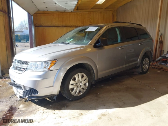 2019 Dodge Journey SE Value Pkg with VIN 3C4PDCAB0KT865612, listed as a IAAI auction lot 41688300 with 82,936 mi miles. Bid and sale history available at carsss.com. Image 17.