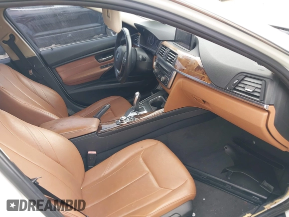 2012 BMW 3 Series 328i with VIN WBA3A5C57CF347953, listed as a IAAI auction lot 42176008 with 140,598 mi miles and . Bid and sale history available at carsss.com. Image 5.
