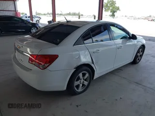 2014 Chevrolet Cruze 1LT with VIN 1G1PC5SB2E7226761, listed as a IAAI auction lot 42029133 with 153,738 mi miles and . Bid and sale history available at DreamBid. Image 4.