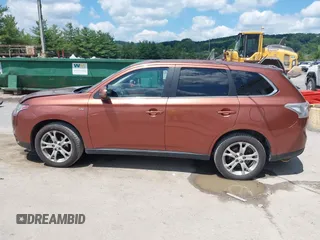 2014 Mitsubishi Outlander GT with VIN JA4JZ4AX6EZ006606, listed as a IAAI auction lot 42640681 with 161,904 mi miles and . Bid and sale history available at DreamBid. Image 15.