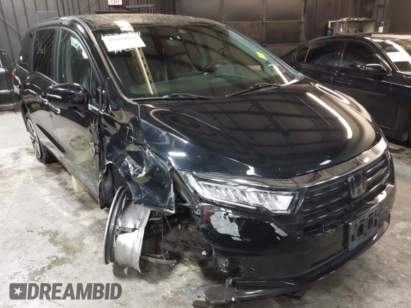 2021 Honda Odyssey Touring with VIN 5FNRL6H83MB040138, listed as a IAAI auction lot 39150096 with 61,322 mi miles and . Bid and sale history available at DreamBid. Image 1.