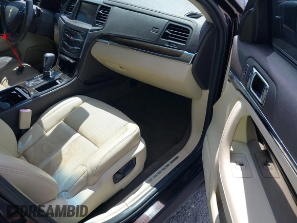 2014 Lincoln MKS with VIN 1LNHL9EK0EG608300, listed as a IAAI auction lot 41900902 with 144,253 mi miles. Bid and sale history available at carsss.com. Image 5.