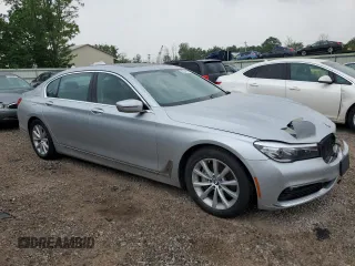 2018 BMW 7 Series 740i xDrive with VIN WBA7E4C56JGV23835, listed as a Copart auction lot 55254573 with 103,713 mi miles. Bid and sale history available at carsss.com. Image 4.