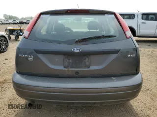 2005 Ford Focus S with VIN 3FAFP37NX5R134987, listed as a Copart auction lot 60478825 with 204,927 mi miles and Clean title. Bid and sale history available at DreamBid. Image 6.