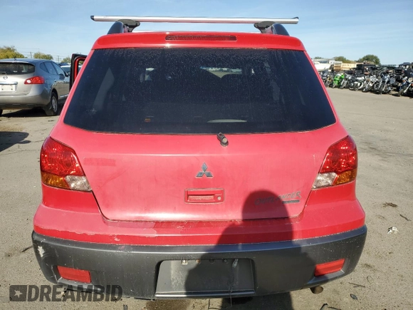 2004 Mitsubishi Outlander LS z VIN JA4LZ31F44U037794, wystawiony jako Copart lot #77416374 z przebiegiem 168 970 mil mil oraz Szkoda całkowita • Salvage title. Historia ofert i sprzedaży dostępna na DreamBid. Obrazek 6.