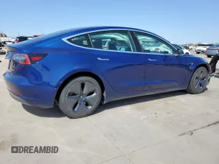 2020 Tesla Model 3 Long Range with VIN 5YJ3E1EB6LF617634, listed as a Copart auction lot 87010814 with 72,916 mi miles and Salvage Title. Bid and sale history available at carsss.com. Image 3.