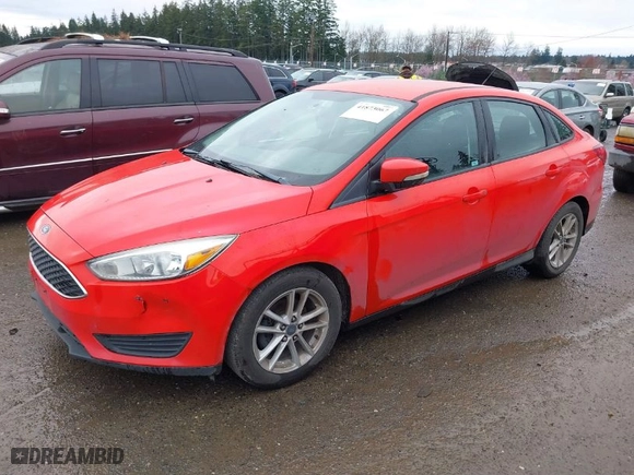 2016 Ford Focus SE with VIN 1FADP3F29GL268809, listed as a IAAI auction lot 41873067 with 135,593 mi miles. Bid and sale history available at carsss.com. Image 2.