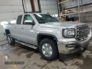 2018 GMC Sierra 1500 SLE z VIN 1GTV2MEH8JZ357073, wystawiony jako IAAI lot #41642234 z przebiegiem 105 007 mil mil oraz . Historia ofert i sprzedaży dostępna na DreamBid. Obrazek 1.