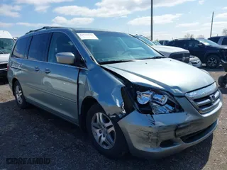 2005 Honda Odyssey EX-L with VIN 5FNRL38765B094377, listed as a IAAI auction lot 41933616 with 213,979 mi miles. Bid and sale history available at carsss.com. Image 6.