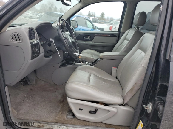 2007 GMC Envoy SLT with VIN 1GKDT13S972141714, listed as a Copart auction lot 46589735 with 82,556 mi miles and Salvage Title. Bid and sale history available at carsss.com. Image 7.