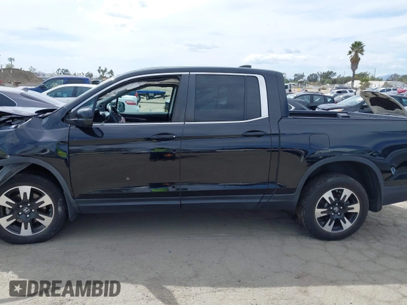 2020 Honda Ridgeline RTL with VIN 5FPYK3F53LB030107, listed as a IAAI auction lot 41933517 with 93,373 mi miles and . Bid and sale history available at DreamBid. Image 14.