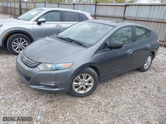 2010 Honda Insight EX with VIN JHMZE2H7XAS024879, listed as a IAAI auction lot 42029553 with 187,648 mi miles. Bid and sale history available at carsss.com. Image 2.