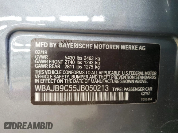2018 BMW 5 Series M550i xDrive with VIN WBAJB9C55JB050213, listed as a Copart auction lot 61714255 with 34,700 mi miles and Salvage title. Bid and sale history available at DreamBid. Image 12.
