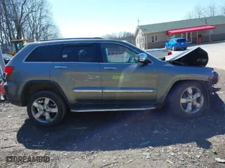 2012 Jeep Grand Cherokee Limited with VIN 1C4RJFBG9CC272826, listed as a IAAI auction lot 41833337 with 108,295 mi miles. Bid and sale history available at carsss.com. Image 13.