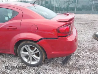 2014 Dodge Avenger SE with VIN 1C3CDZAB0EN220002, listed as a IAAI auction lot 41719914 with 165,330 mi miles and . Bid and sale history available at DreamBid. Image 15.