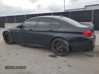 2013 BMW M5 z VIN WBSFV9C57DD096739, wystawiony jako Copart lot #59640315 z przebiegiem 85 840 mil mil oraz Czysty tytuł • Clean title. Historia ofert i sprzedaży dostępna na DreamBid. Obrazek 2.