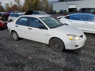 2005 Mitsubishi Lancer ES with VIN JA3AJ26E55U036958, listed as a Copart auction lot 79773814 with 215,965 mi miles and Salvage Title. Bid and sale history available at carsss.com. Image 4.
