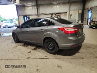 2012 Ford Focus SE with VIN 1FAHP3F28CL208855, listed as a Copart auction lot 63766165 with 168,183 mi miles and Salvage title. Bid and sale history available at DreamBid. Image 2.