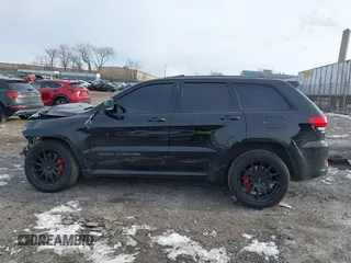 2017 Jeep Grand Cherokee SRT with VIN 1C4RJFDJ7HC641926, listed as a IAAI auction lot 41272215 with 117,667 mi miles. Bid and sale history available at carsss.com. Image 13.