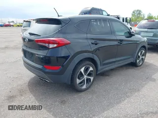 2016 Hyundai Tucson Limited with VIN KM8J33A27GU181240, listed as a IAAI auction lot 42183028 with 104,557 mi miles. Bid and sale history available at carsss.com. Image 4.