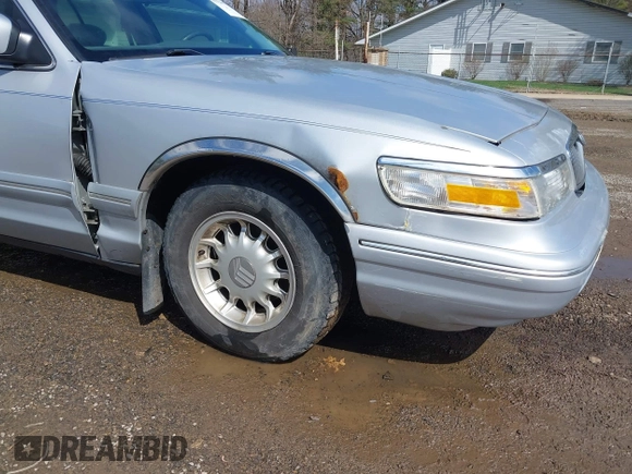 1997 Mercury Grand Marquis LS with VIN 2MELM75W3VX717801, listed as a IAAI auction lot 41920075 with 173,730 mi miles and . Bid and sale history available at DreamBid. Image 18.