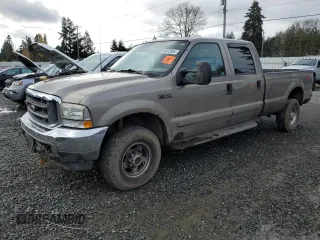 2003 Ford F-350 XL with VIN 1FTSW31F13EA13259, listed as a Copart auction lot 80345954 with 209,898 mi miles and Salvage Title. Bid and sale history available at DreamBid. Image 1.