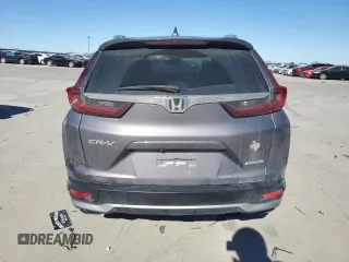 2020 Honda CR-V Touring z VIN 7FARW1H95LE002254, wystawiony jako Copart lot #42535505 z przebiegiem 77 004 mil mil oraz Szkoda całkowita • Salvage title. Historia ofert i sprzedaży dostępna na DreamBid. Obrazek 6.