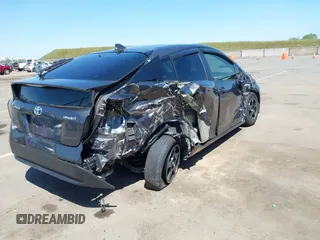 2016 Toyota Prius Two z VIN JTDKBRFU1G3521884, wystawiony jako IAAI lot #42081852 z przebiegiem 93 107 mil mil oraz . Historia ofert i sprzedaży dostępna na DreamBid. Obrazek 4.