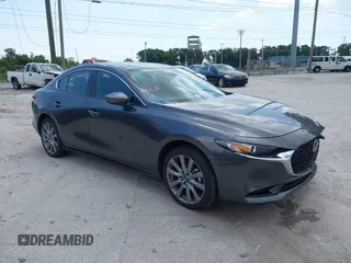 2025 Mazda 3 S Preferred with VIN JM1BPACM5S1762195, listed as a IAAI auction lot 42302805 with 12,940 mi miles and . Bid and sale history available at DreamBid. Image 1.