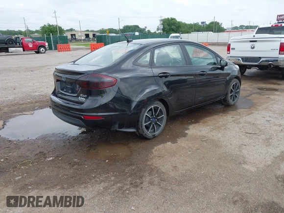 2015 Ford Fiesta SE with VIN 3FADP4BJXFM135864, listed as a IAAI auction lot 39462016 with 113,486 mi miles and . Bid and sale history available at DreamBid. Image 4.