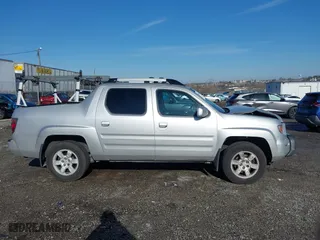 2006 Honda Ridgeline RTL with VIN 2HJYK165X6H570027, listed as a IAAI auction lot 41868389 with 207,020 mi miles. Bid and sale history available at carsss.com. Image 13.