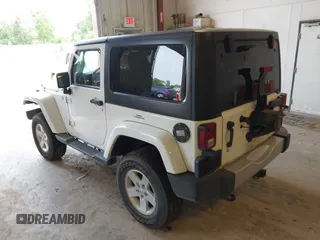 2015 Jeep Wrangler Sahara with VIN 1C4AJWBG7FL648621, listed as a IAAI auction lot 42439781 with 107,148 mi miles and . Bid and sale history available at DreamBid. Image 3.