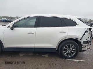 2019 Mazda CX-9 Touring with VIN JM3TCACY2K0328347, listed as a IAAI auction lot 41917854 with 67,173 mi miles and . Bid and sale history available at DreamBid. Image 14.