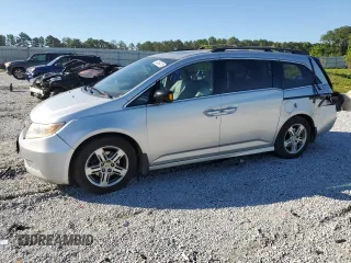 2013 Honda Odyssey Touring with VIN 5FNRL5H92DB014648, listed as a Copart auction lot 63850415 with 206,966 mi miles and Salvage title. Bid and sale history available at DreamBid. Image 1.