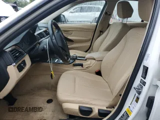 2014 BMW 3 Series 320i xDrive with VIN WBA3C3C51EF983592, listed as a Copart auction lot 60608765 with 195,061 mi miles and Salvage title. Bid and sale history available at DreamBid. Image 7.