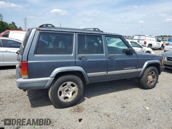 2001 Jeep Cherokee Sport with VIN 1J4FT48S31L596648, listed as a Copart auction lot 54101345 with 190,688 mi miles and Clean title. Bid and sale history available at DreamBid. Image 3.