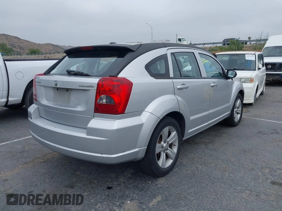 2010 Dodge Caliber SXT z VIN 1B3CB4HA9AD619378, wystawiony jako IAAI lot #42068680 z przebiegiem 182 668 mil mil oraz . Historia ofert i sprzedaży dostępna na DreamBid. Obrazek 4.