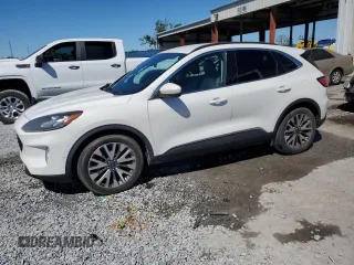 2021 Ford Escape Titanium Hybrid z VIN 1FMCU0DZ5MUB04522, wystawiony jako Copart lot #49127385 z przebiegiem 66 996 mil mil oraz Szkody całkowita. Historia ofert i sprzedaży dostępna na DreamBid. Obrazek 1.
