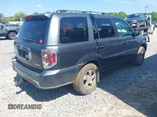 2006 Honda Pilot EX-L with VIN 2HKYF187X6H557468, listed as a IAAI auction lot 42017101 with 213,425 mi miles and . Bid and sale history available at carsss.com. Image 4.