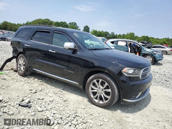2017 Dodge Durango Citadel Anodized Platinum with VIN 1C4RDHEG5HC774691, listed as a Copart auction lot 57885025 with 176,240 mi miles and Salvage title. Bid and sale history available at DreamBid. Image 4.