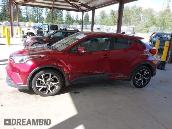 2018 Toyota C-HR XLE with VIN NMTKHMBX6JR027381, listed as a IAAI auction lot 42149905 with 118,897 mi miles and . Bid and sale history available at DreamBid. Image 14.