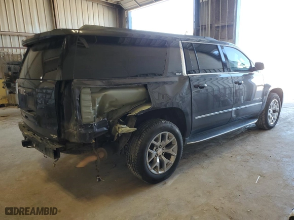 2017 GMC Yukon XL SLT with VIN 1GKS1GKC1HR390673, listed as a Copart auction lot 79182304 with 165,266 mi miles and Salvage Title. Bid and sale history available at carsss.com. Image 3.