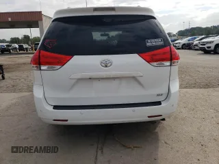 2012 Toyota Sienna XLE AAS with VIN 5TDYK3DC0CS250830, listed as a Copart auction lot 73323284 with 147,580 mi miles and Salvage Title. Bid and sale history available at DreamBid. Image 6.