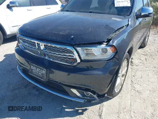 2014 Dodge Durango Citadel with VIN 1C4SDJETXEC390326, listed as a IAAI auction lot 40620779 with 119,537 mi miles and . Bid and sale history available at DreamBid. Image 6.