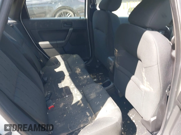 2011 Ford Focus SE with VIN 1FAHP3FN2BW100531, listed as a IAAI auction lot 42006640 with 63,563 mi miles and . Bid and sale history available at DreamBid. Image 8.