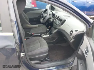 2015 Chevrolet Sonic LT with VIN 1G1JC5SH9F4127898, listed as a IAAI auction lot 41976381 with 148,658 mi miles. Bid and sale history available at carsss.com. Image 5.