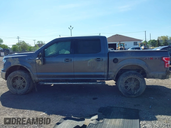 2018 Ford F-150 XL with VIN 1FTEW1EG1JFC91543, listed as a IAAI auction lot 42307775 with 102,055 mi miles and . Bid and sale history available at DreamBid. Image 14.