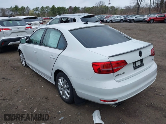 2015 Volkswagen Jetta Sedan 1.8T SE with VIN 3VWD17AJXFM334862, listed as a IAAI auction lot 42039243 with 94,996 mi miles. Bid and sale history available at carsss.com. Image 3.